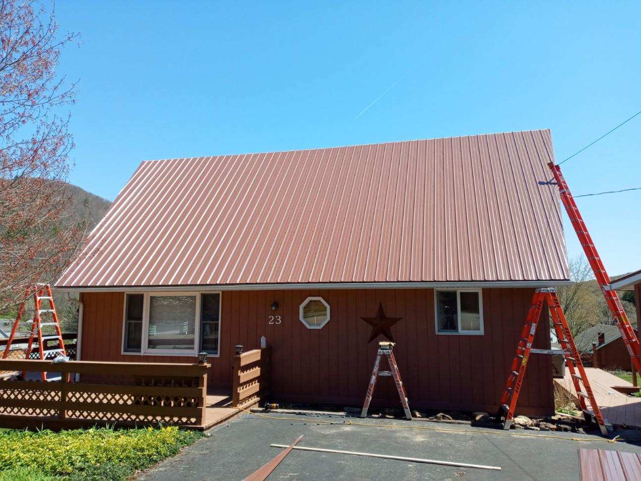 New Cocoa Brown metal roof going on a cottage with a front deck